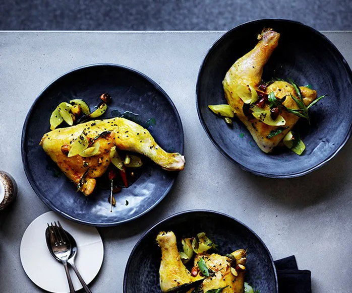 Turmeric chicken with lemon pickle and almonds
