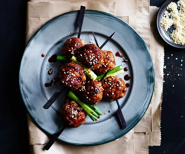 Sticky soy-glazed meatball skewers