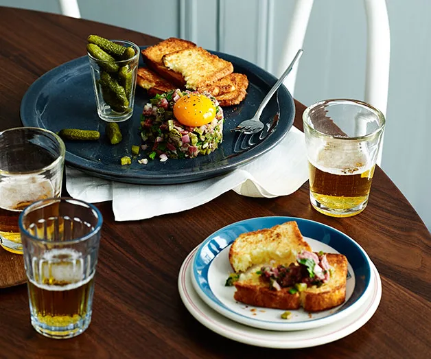 Steak tartare with toasted brioche and cornichons