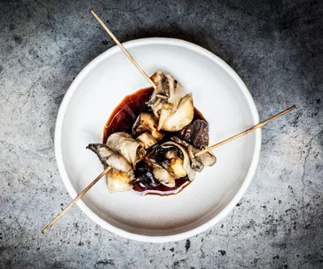 Matt Stone and Ben Ing’s grilled Akoya with mushrooms and truffle jus