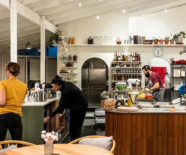 Staff in open kitchen and dining room at Alberta's in Busselton, WA
