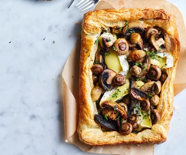 Mixed mushroom tart with puff pastry and brie