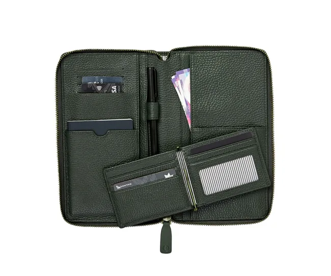 Open green leather travel wallet with cards, money, and pen.