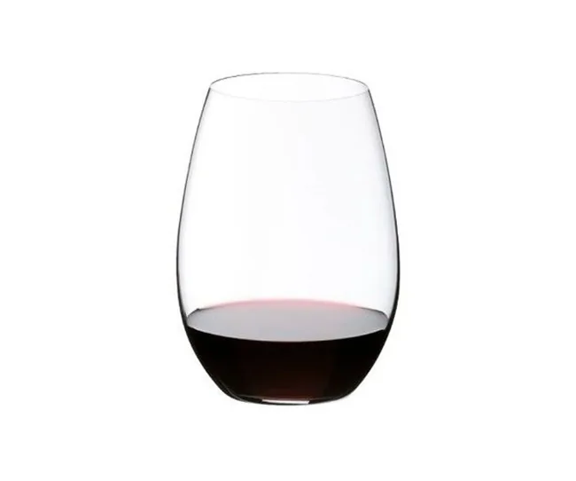 A stemless wine glass on a white background, partially filled with red wine.