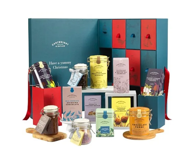 Cartwright & Butler Christmas gift set with assorted luxury food items in decorative packaging.