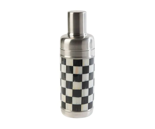 Stainless steel cocktail shaker with black and white checkered pattern on the body.