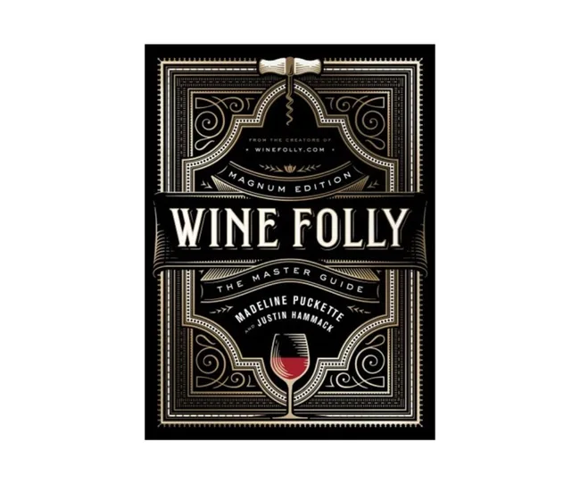 Cover of "Wine Folly: The Master Guide" by Madeline Puckette and Justin Hammack, featuring elegant design and wine glass.
