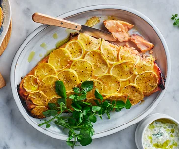 Mustard-baked salmon with a small bowl of fennel tzatziki on the side.
