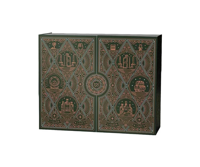 Elegant green gift box with intricate gold geometric and liquor-themed designs.