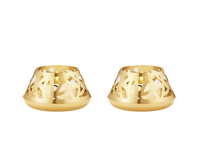 Two gold candle holders with intricate cut-out designs on a white background.