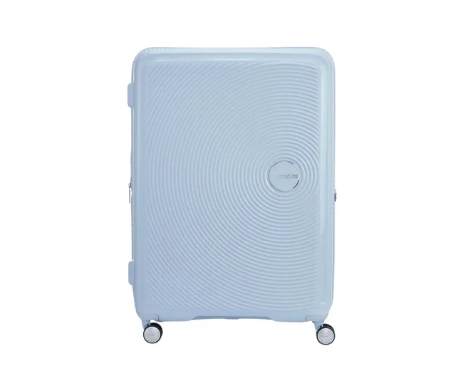 Light blue hard-shell suitcase with circular patterns, four spinner wheels, and a centered brand logo.