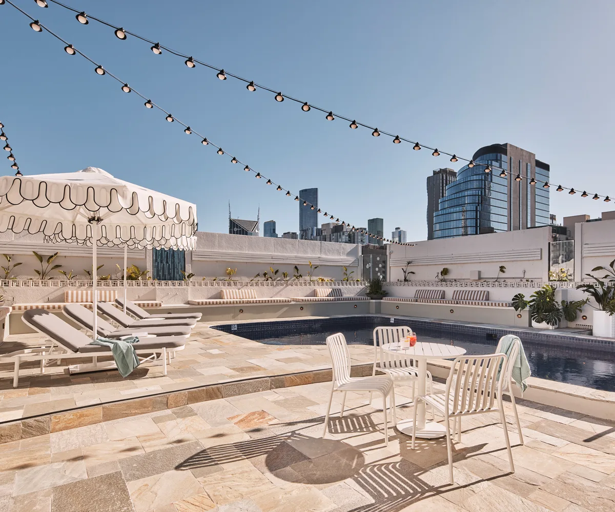 The rooftop pool and bar at Rydges Melbourne