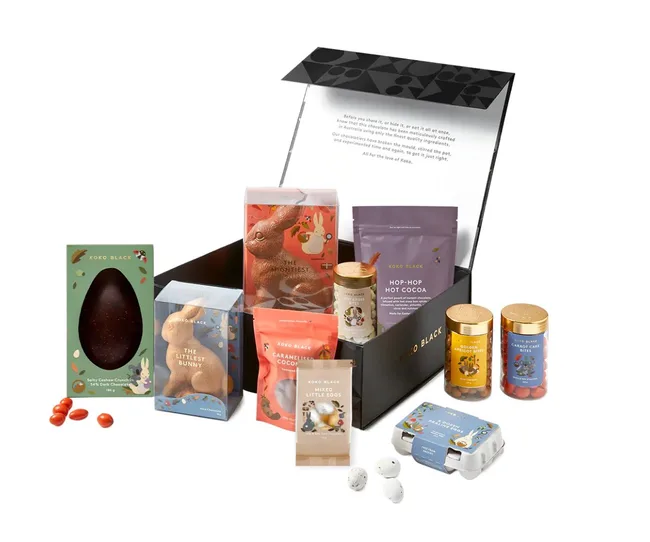 Assorted Koko Black chocolates and treats in Easter-themed packaging, including bunnies, eggs, and cocoa.