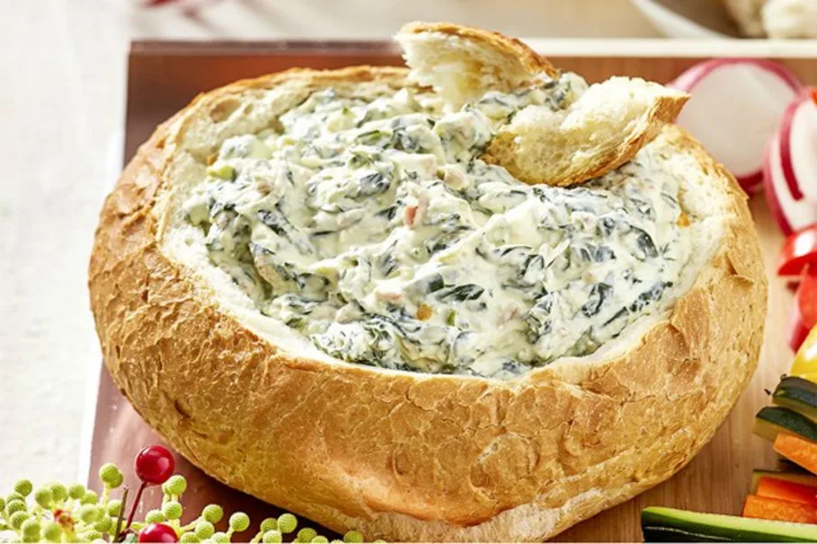 Creamy spinach bacon dip in a cob