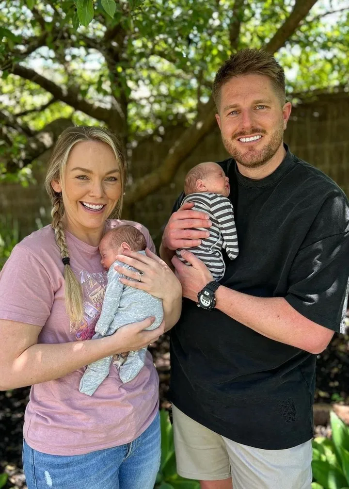 Melissa and Bryce hold their twin boys