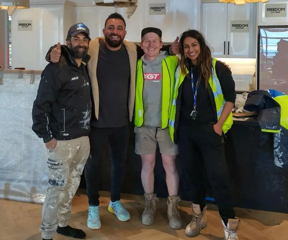 Sharon and Ankur with Ronnie and one of their builders.