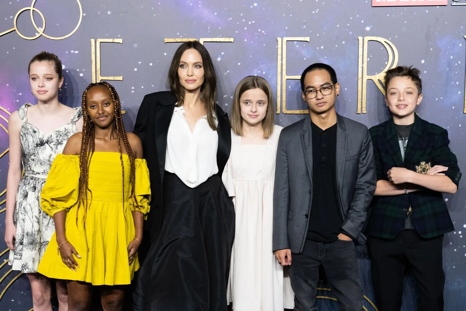 angelina jolies with five of her children at a movie premiere