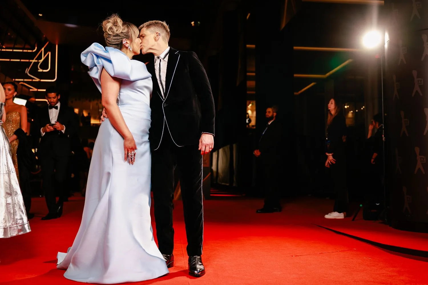 osher gunsberg and wife audrey griffen kiss on the TV Week Logie Awards red carpet.