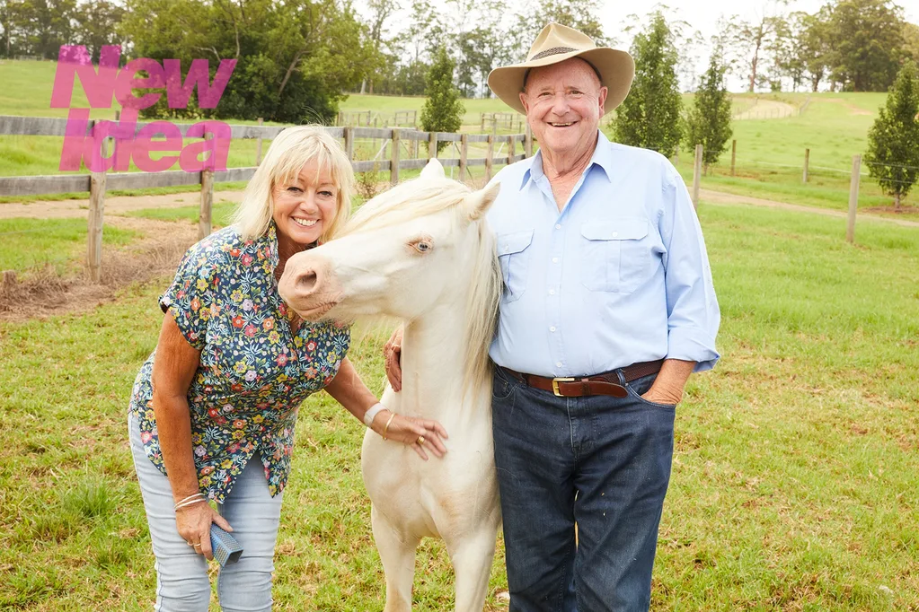 man and woman with horse