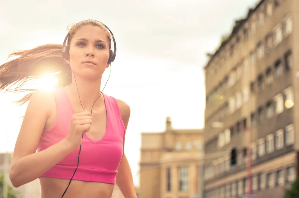 Woman jogging with headphones