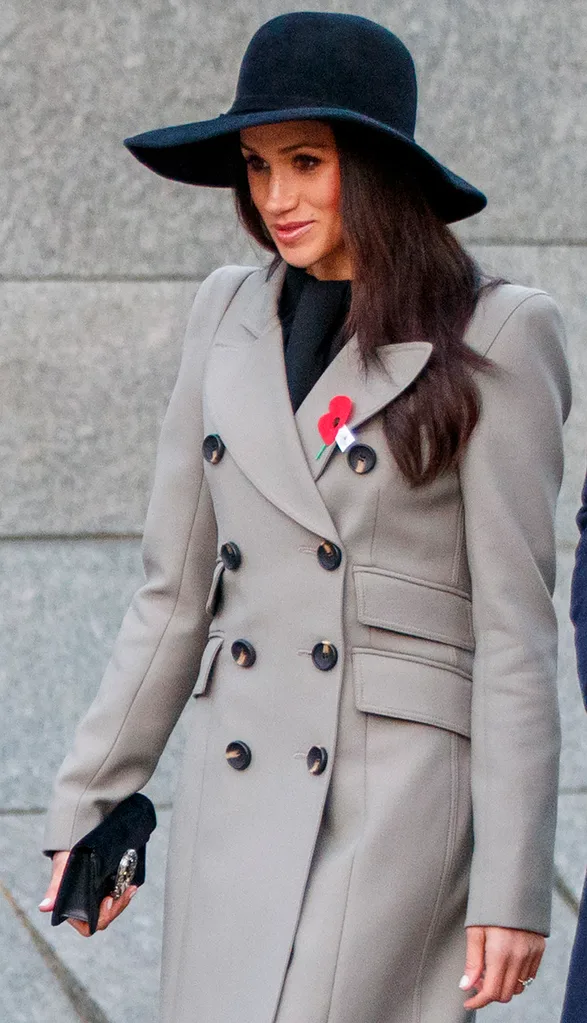 Ms Markle wore a poppy as a mark of respect