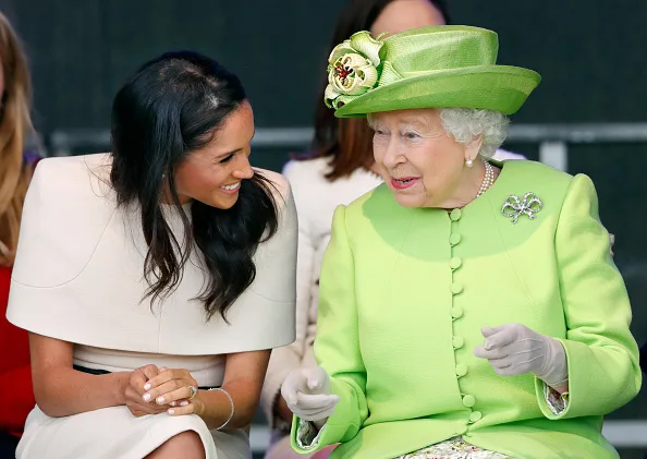 The Queen making Meghan laugh