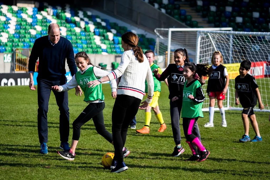 Kate and William play football