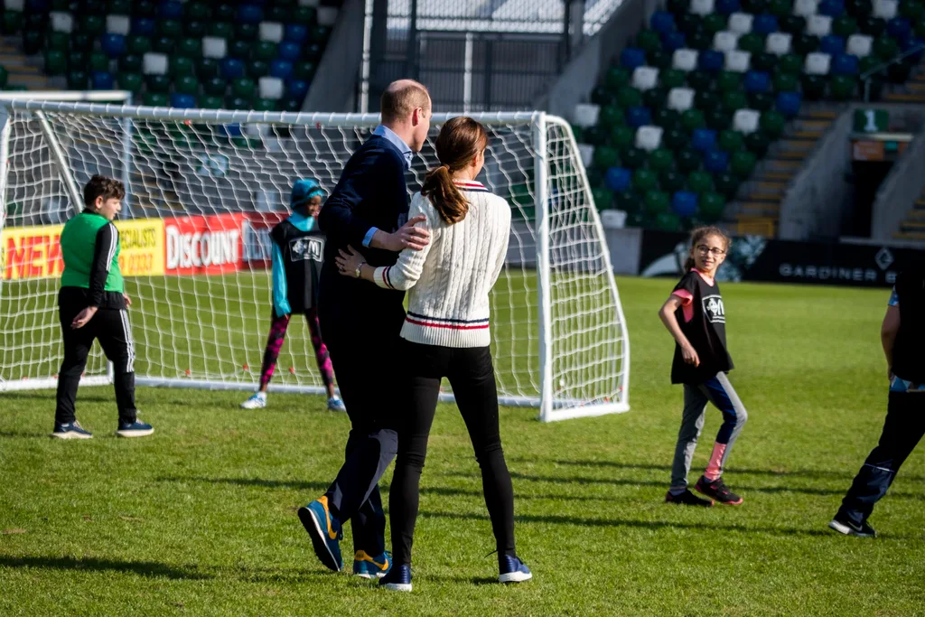 Kate and William have a kick around