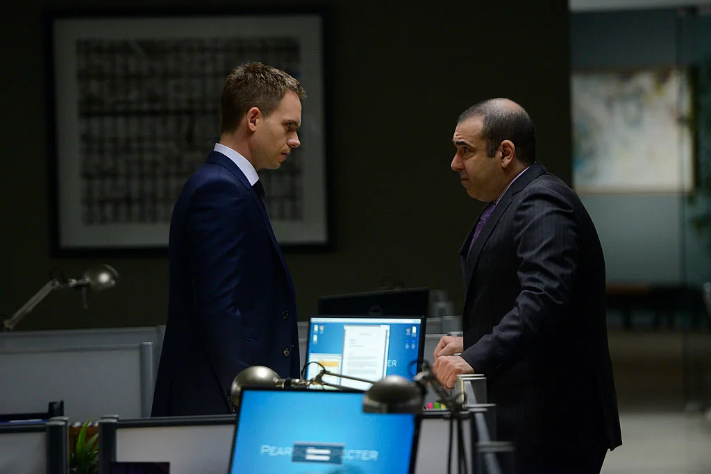 Louis Litt and Mike from the TV show Suits