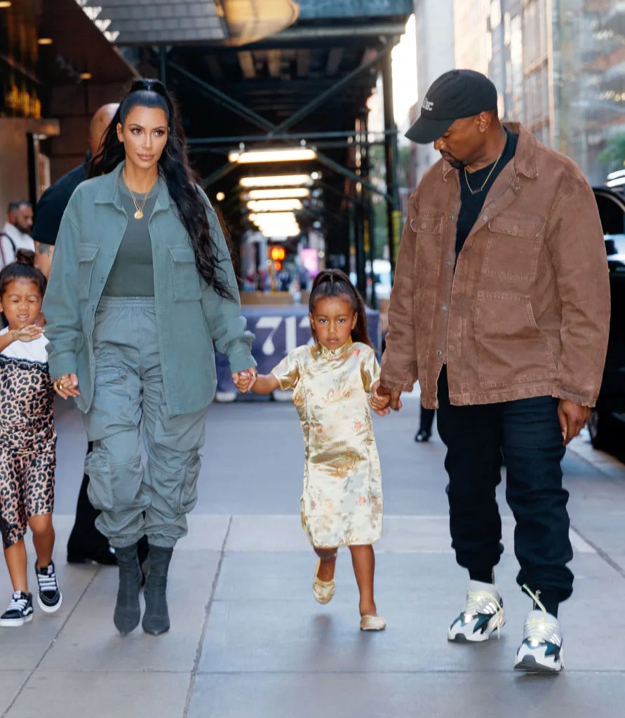 Kim Kardashian & Kanye West with daughter