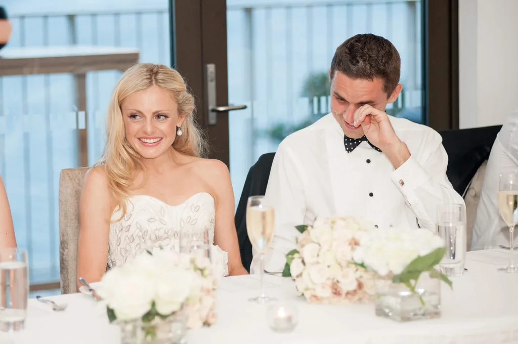 Groom crying at a wedding