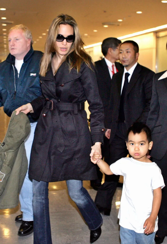 Angelina Jolie with adopted child spotted in an airport