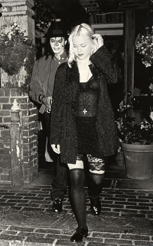 A black and white photo of Michael Jackson & Madonna