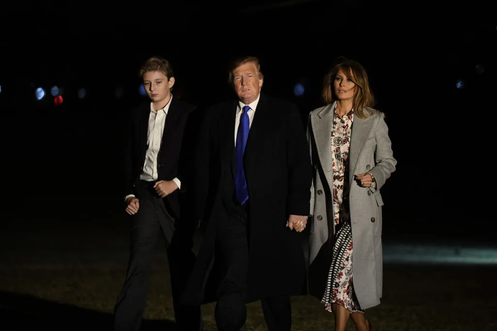 Trump family turning to the White House at night