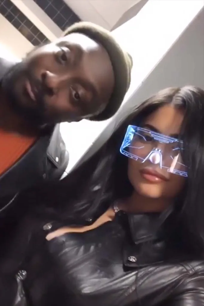 Kylie Jenner tried on Will.I.Am's glasses at J Balvin concert