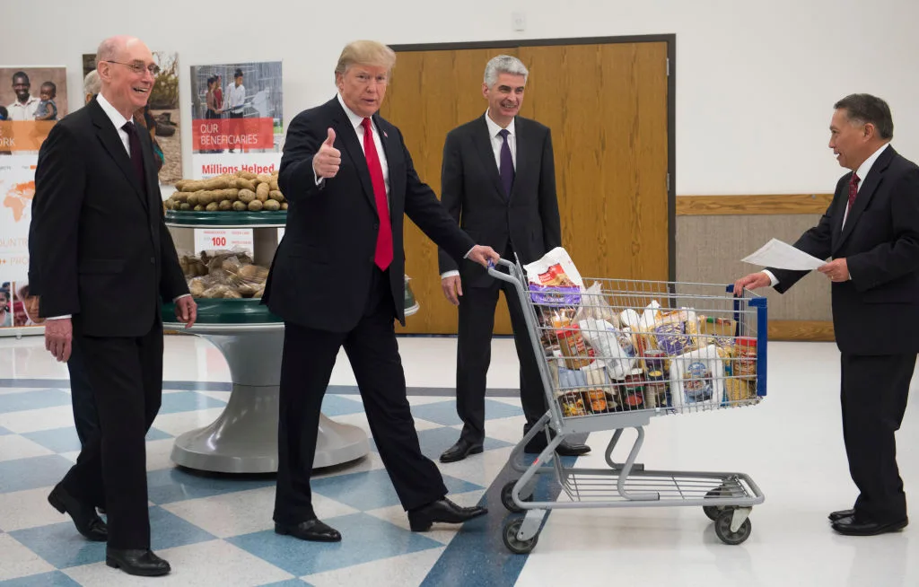 Donald Trump pushing a shopping trolley full of food