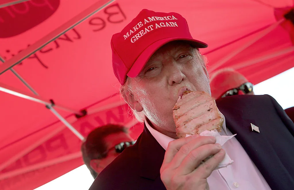 Donaldf Trump pictured eating a pork chop at the Iowa State Fair