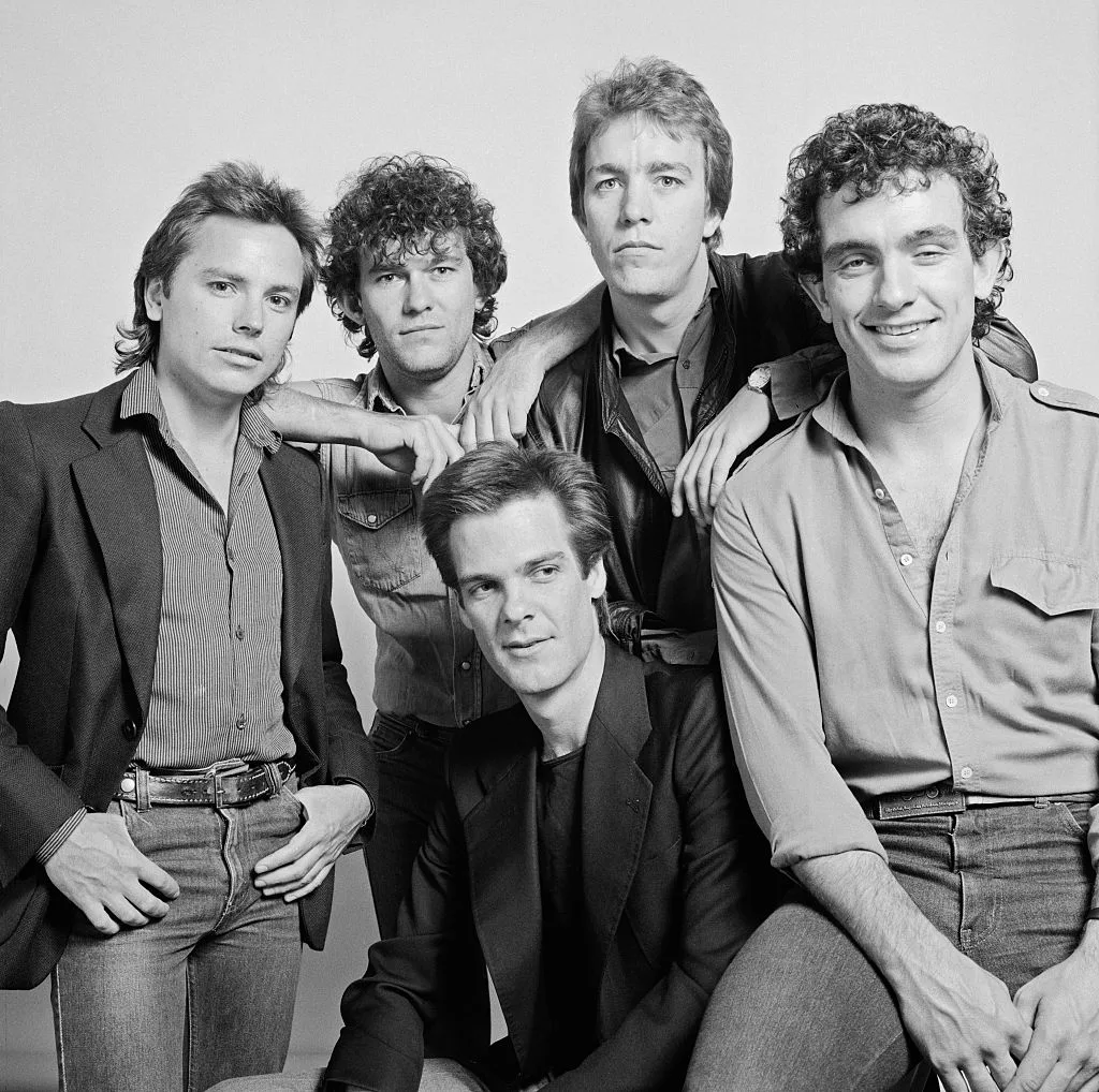 A black and white photo of the Australian band, Cold Chisel