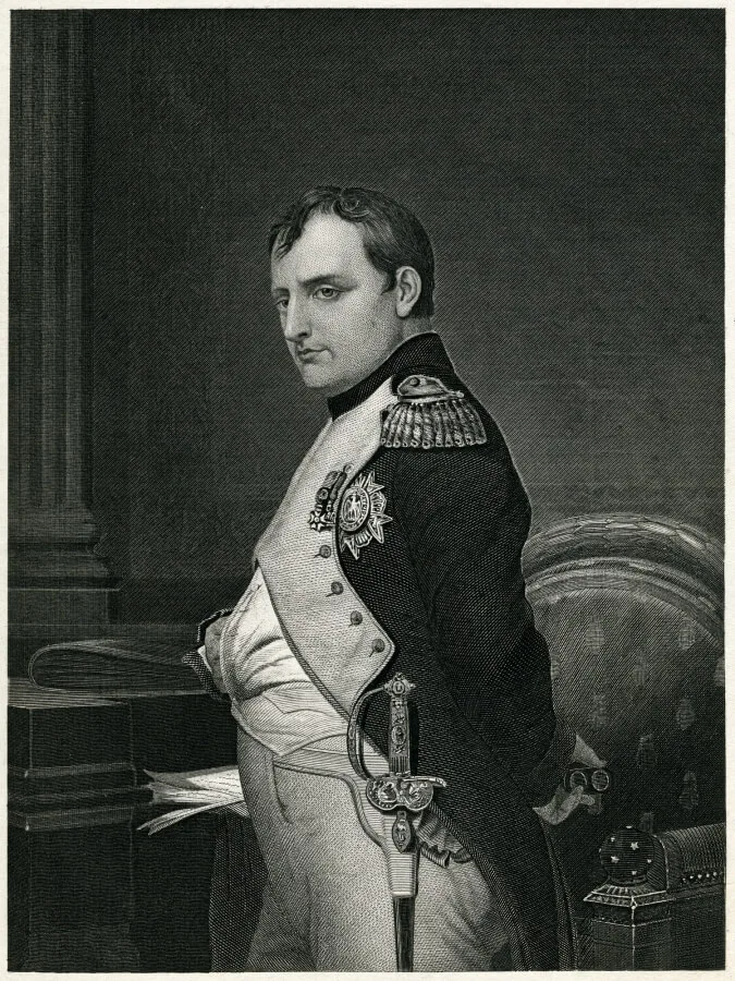 A black and white portrait of Napoleon Bonaparte