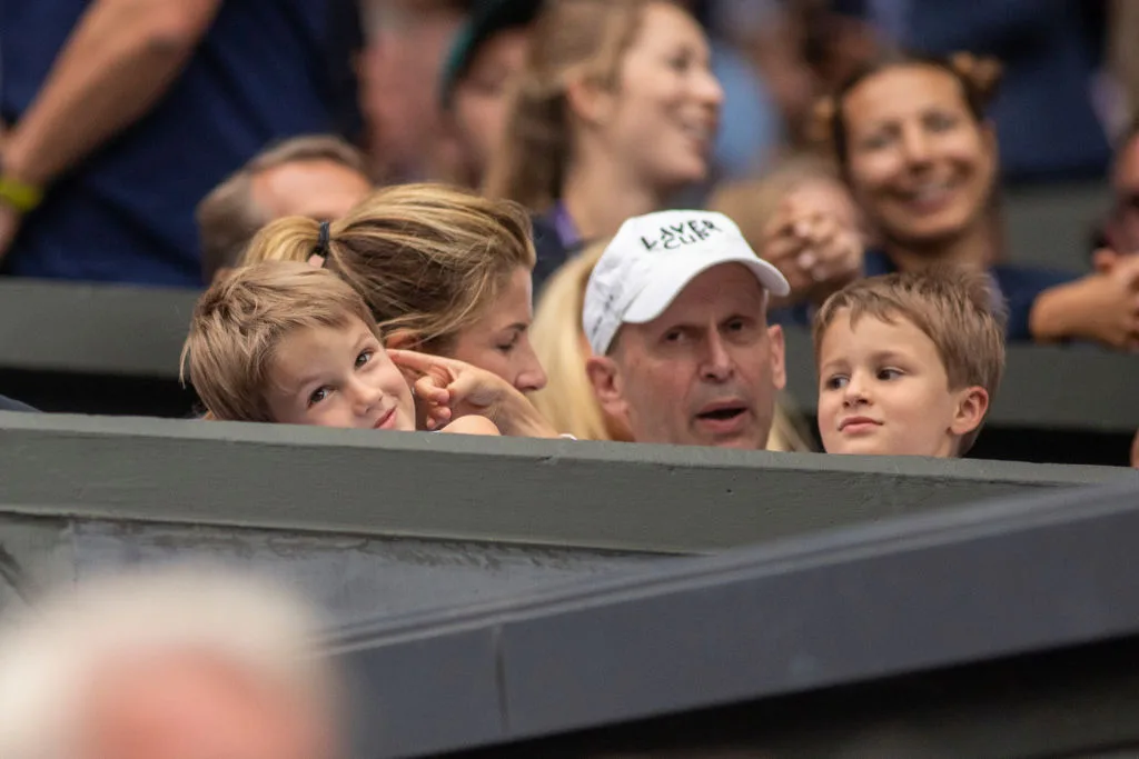 Mirka Federer, wife of Roger Federer, with sons of Leo and Lenny at Wimbledon