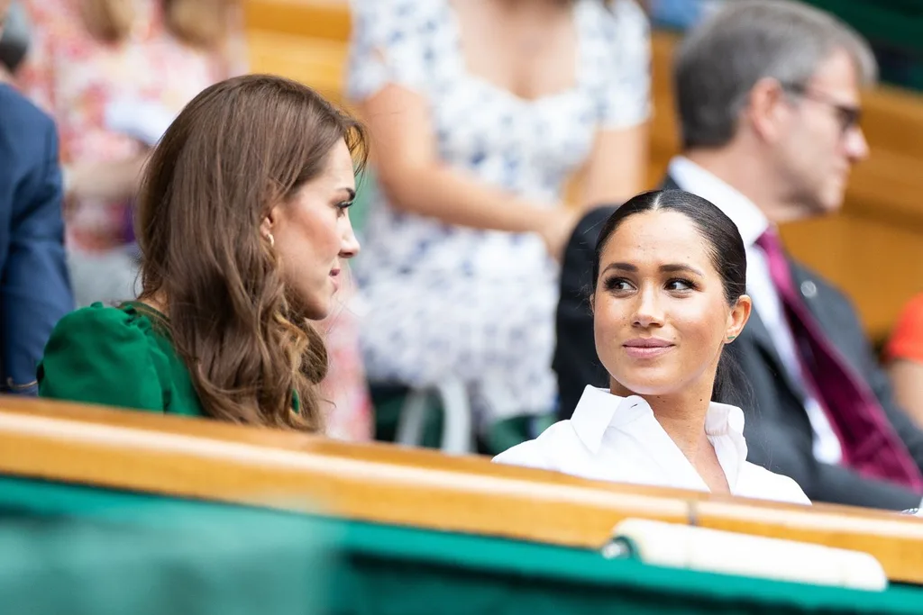 Kate and Meghan watching Wimbledon together last year.