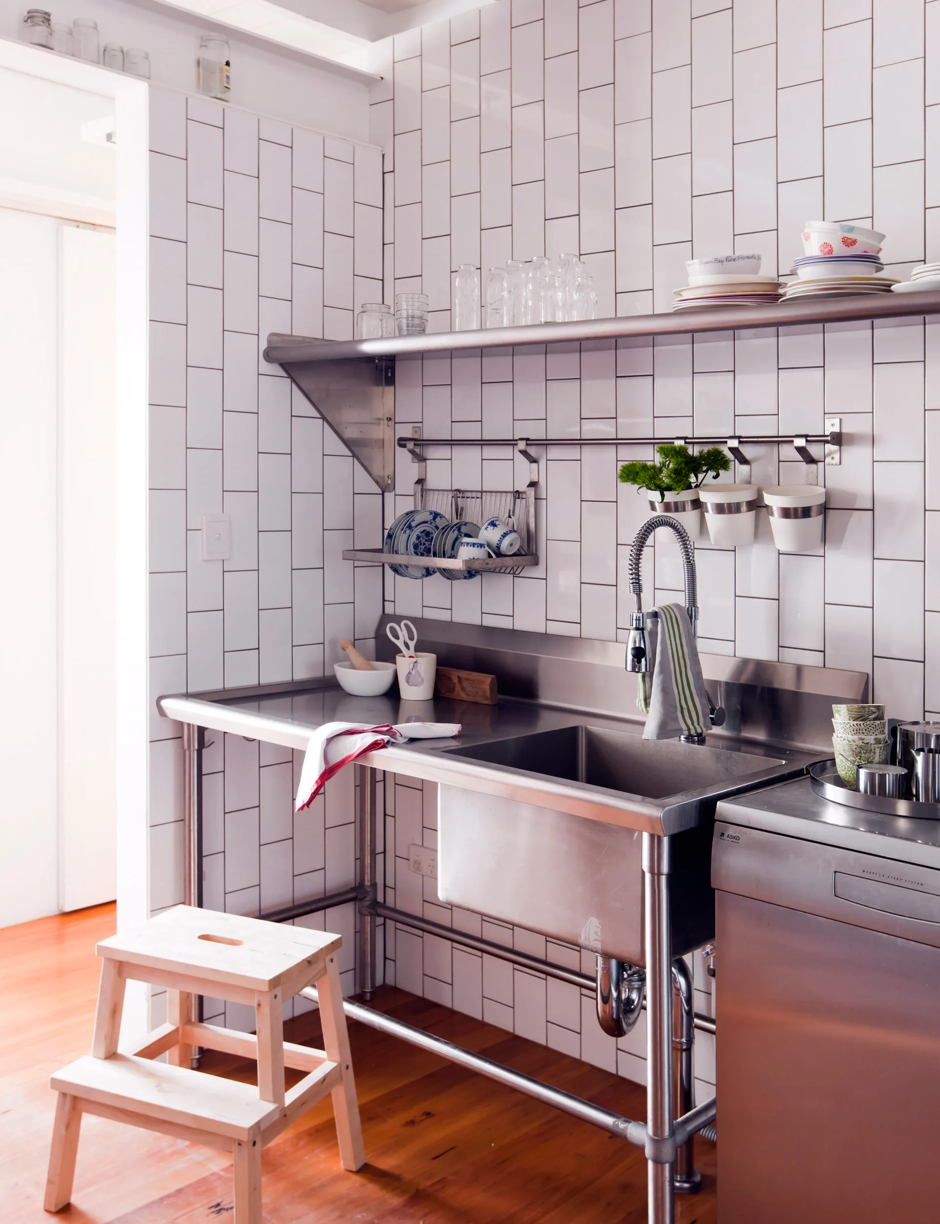 Mix clean lines with aged timber, brick walls, concrete columns and metal skylights.