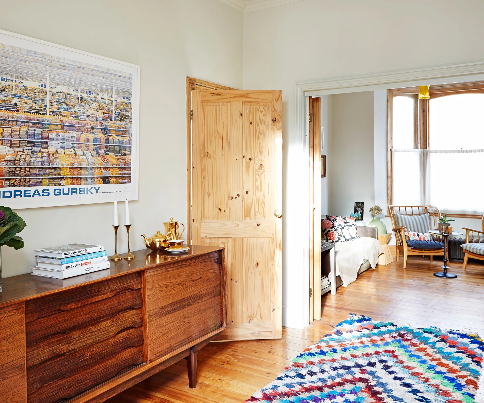 A vintage Danish sideboard provides storage.