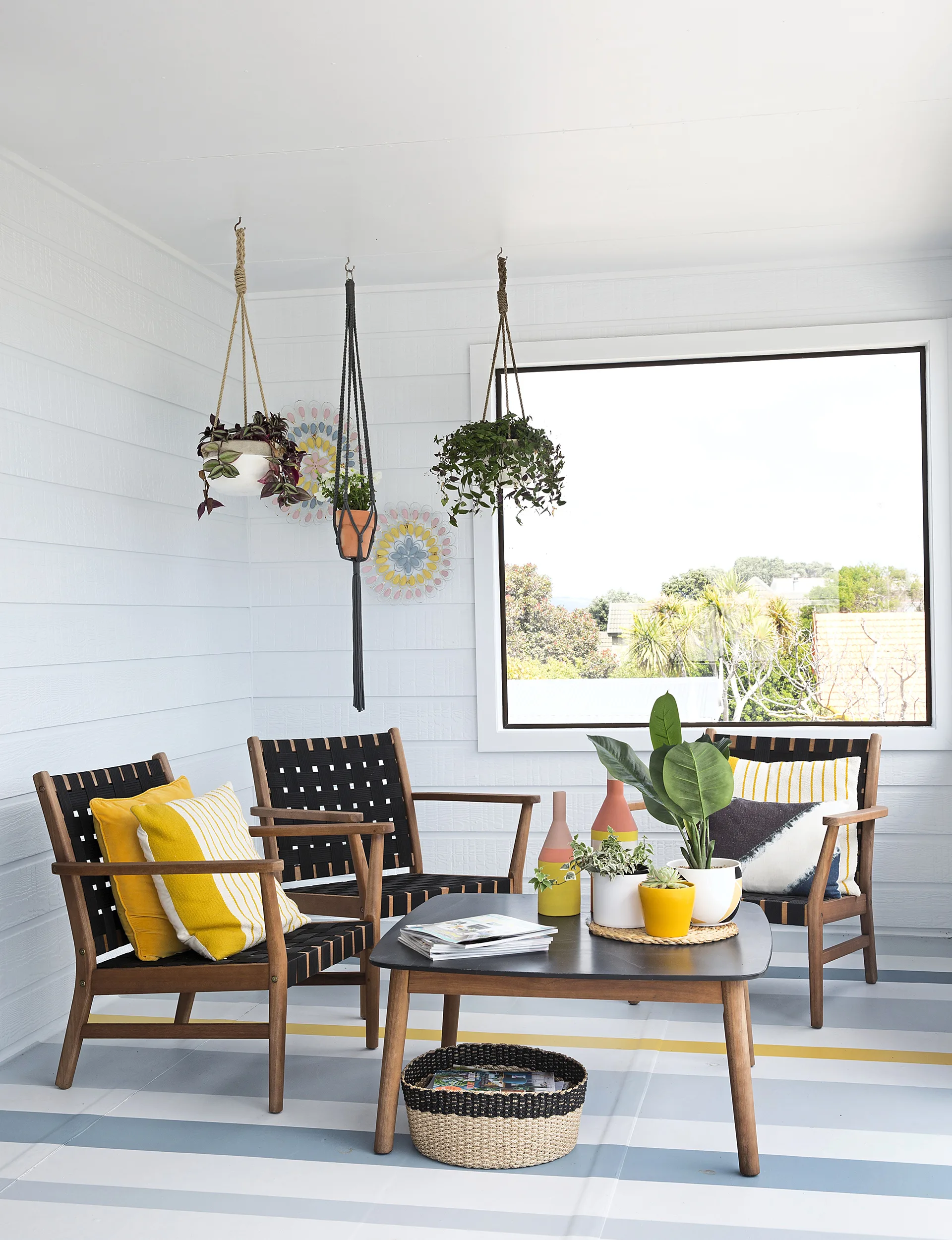 The enclosed deck off the upper storey’s master suite is sheltered from the wind, making it a pleasant spot to be at any time of day. 
