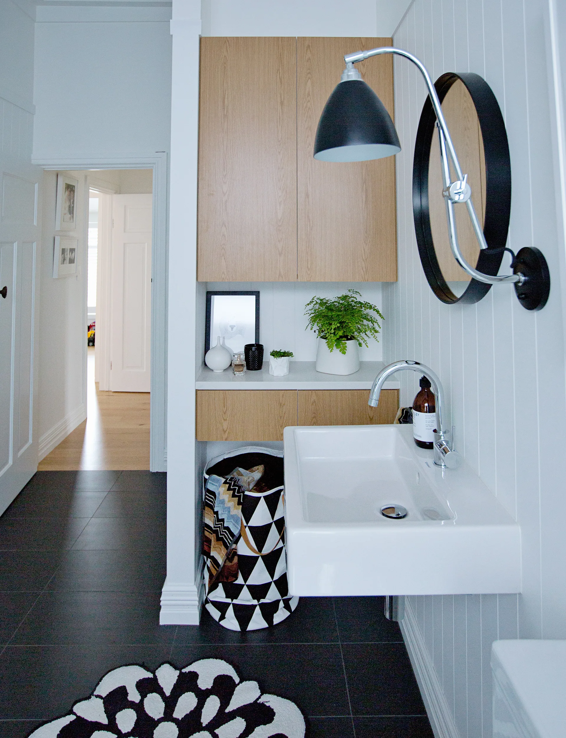 Budget restraints did not allow for tiled walls so HardieGroove was installed to give the space the look and feel of traditional timber panelling. 
