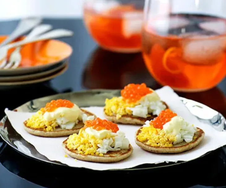 Blini with salmon roe