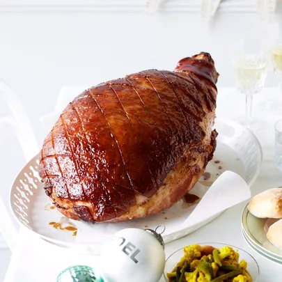 Burnt honey, orange and clove-glazed Christmas ham