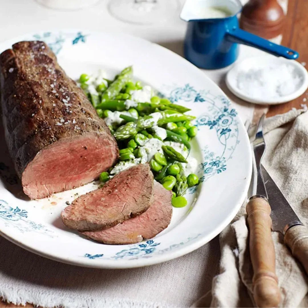 Rare roast beef with spring greens and green goddess dressing