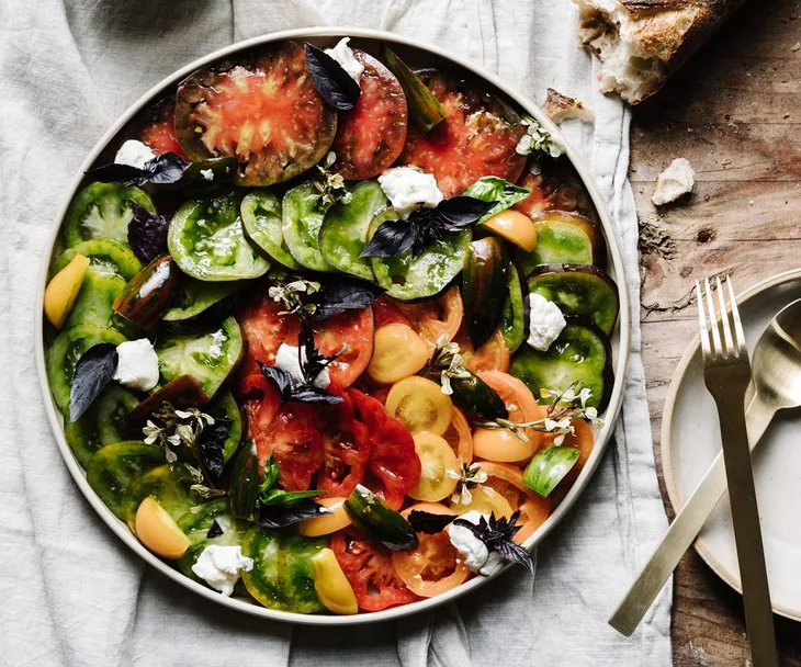 Alla Wolf-Tasker&rsquo;s heirloom tomato and house-made ricotta salad