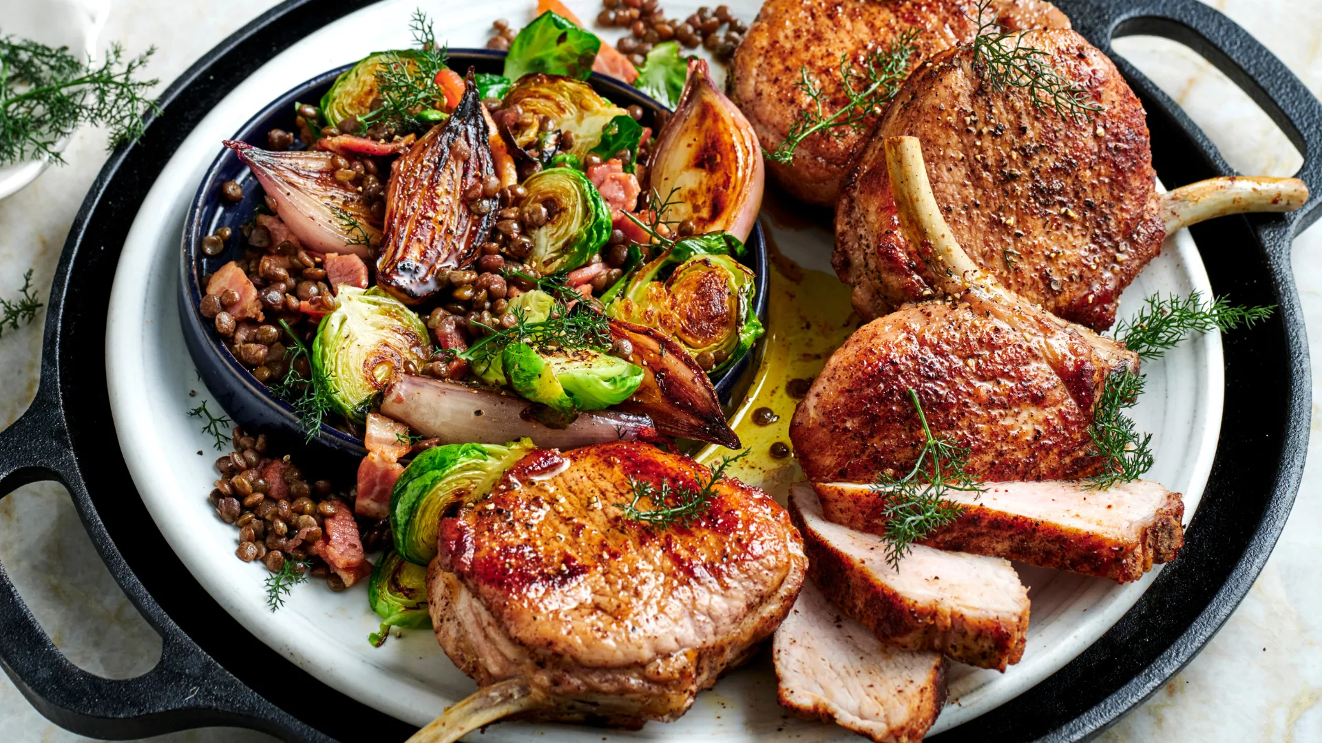 sumac-spiced pork cutlets with Brussels sprout salad